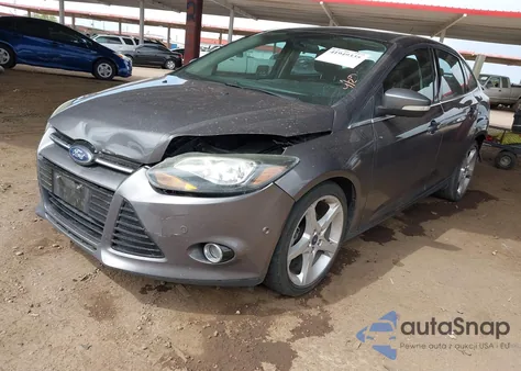 2013 Ford Focus Titanium z USA, uszkodzony, nr VIN 1FADP3J24DL335271